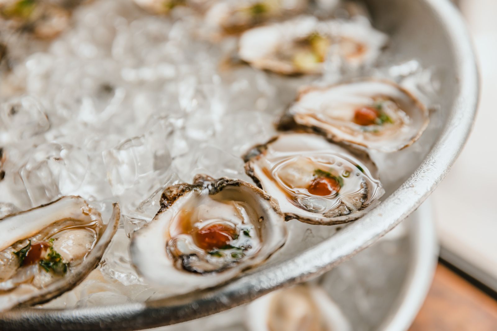 Oysters on ice, dressed with lemon