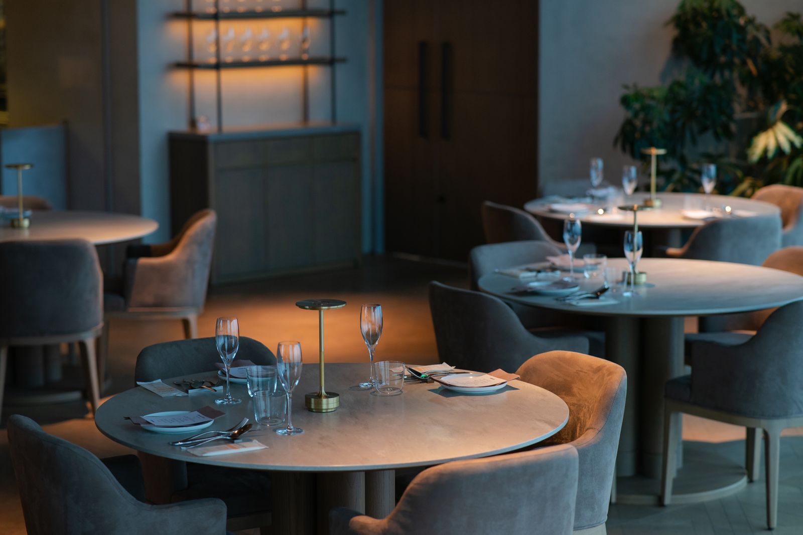 The room, twenty-two seats and a bar